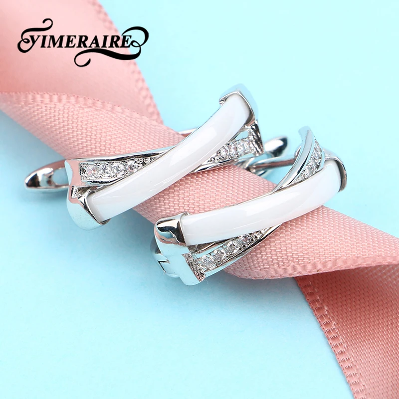 Женские серьги гвоздики из нержавеющей стали X образной формы с кристаллами