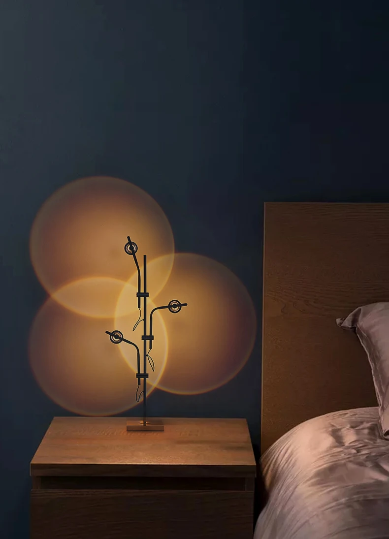 

Three-Head Five-Head Led Rotatable Light and Shadow Decorative Desk Lamp, Made of Silver Stainless Steel, Used In Indoor Rooms.