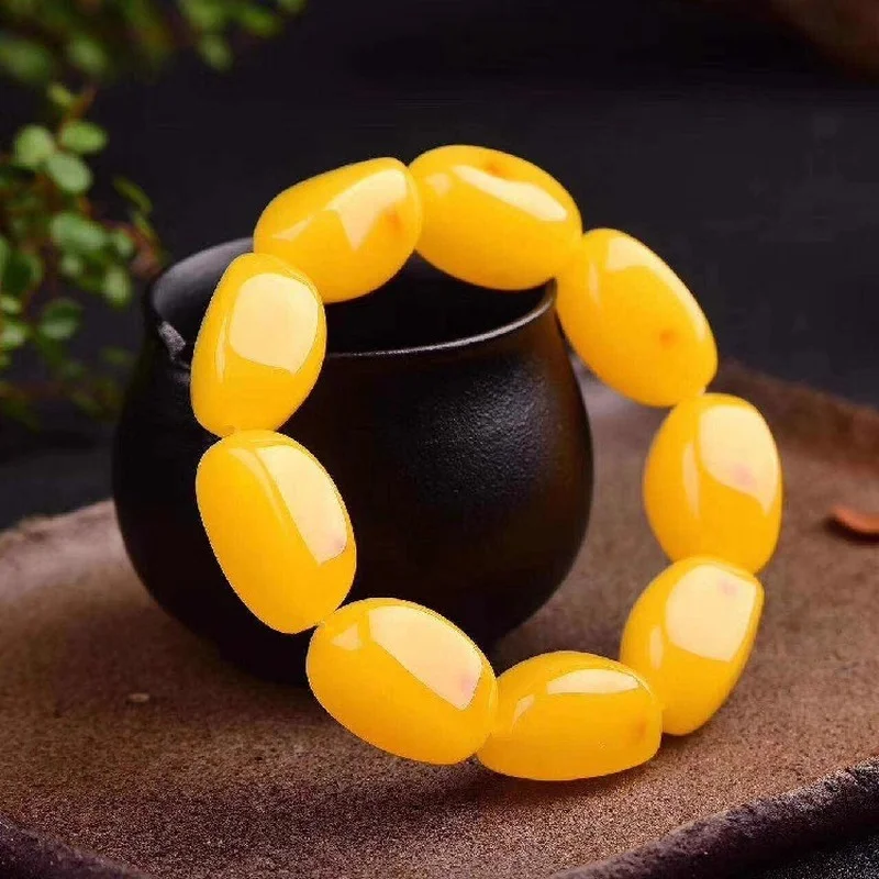 

Chicken Oil Yellow Fluorescent Floating Salt Water with Irregular Beads Honey Wax Hand String Buddha Bead Amber Bracelet Beads
