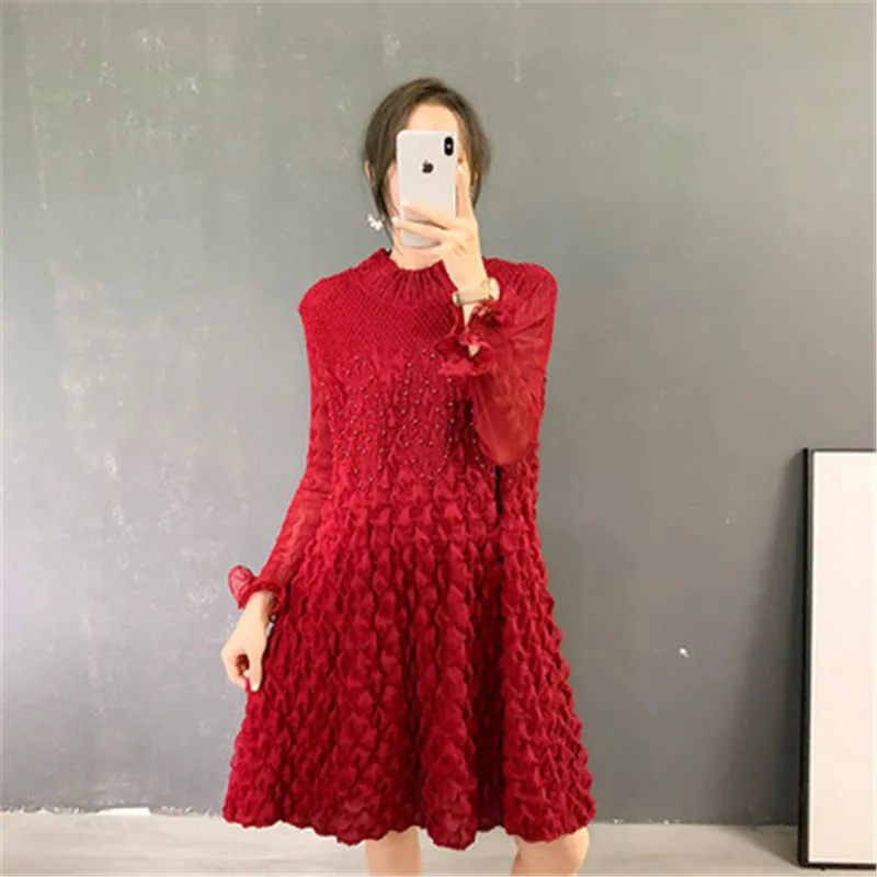 

Folded Miyake 2021 autumn and winter fashion design, hem patch, western style, age-reducing young, wild and thin women's dress