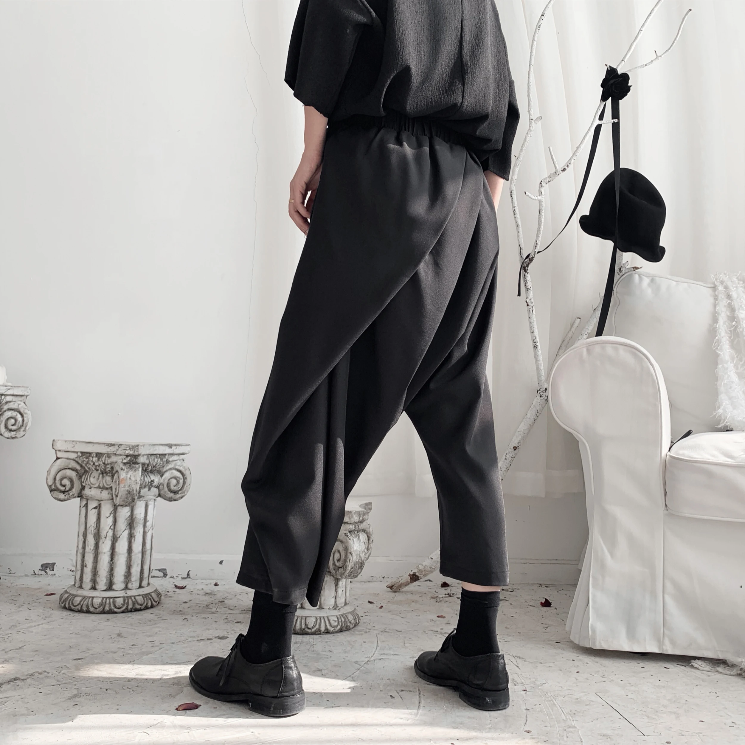 Dark Yamamoto Haute couture with irregular pleated Harem pants and slacks