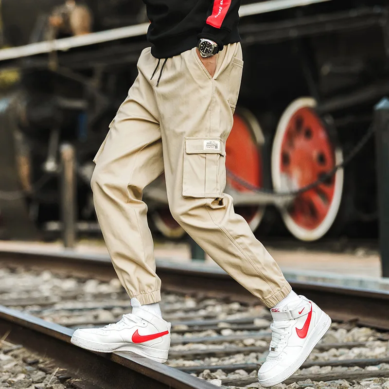 

Men Long Pockets Overalls Tide Brand Leisure Pants Fitness Fashion Hip Hop Fitness Streetwear Trousers Casual Pants
