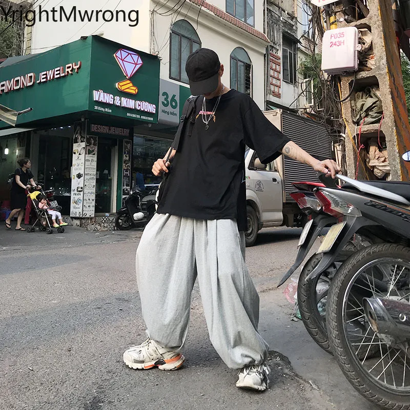 Брюки джоггеры женские с широкими штанинами однотонные мешковатые шаровары