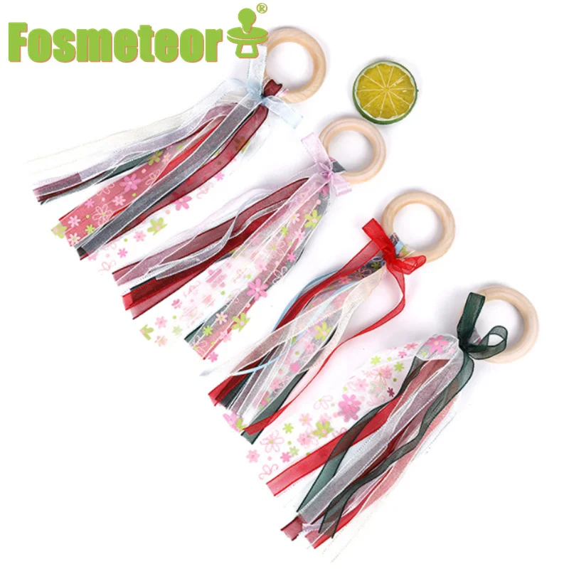 

Fosmeteor New Rainbow Color Stain Ribbon Wooden Ring Waldorf Ribbon With Bell Hand Kite Toy for Birthday Party Toy Favors
