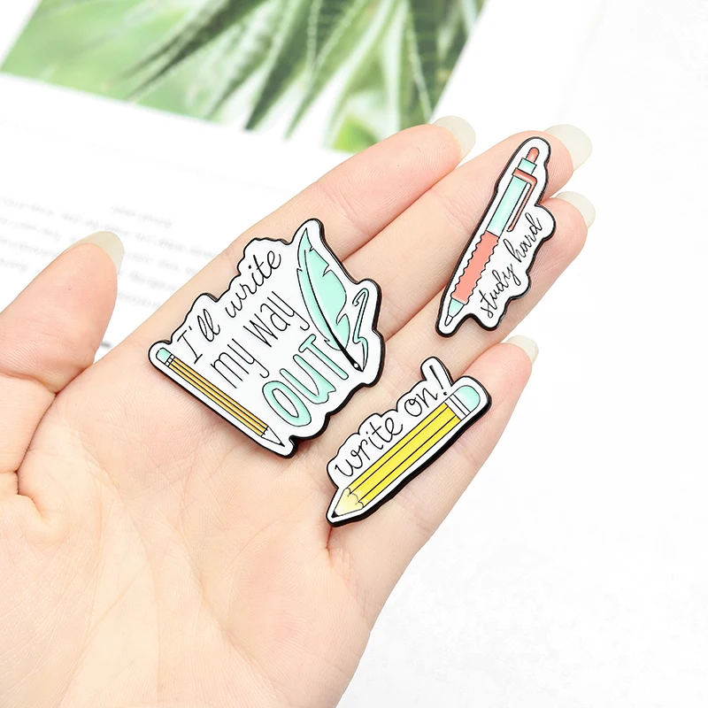 

Cartoon Stationery Enamel Pins Custom Feather Pen Quill Pen Jacket Lapel Pins Pencil Brooches Jewelry Gifts For Writer Students