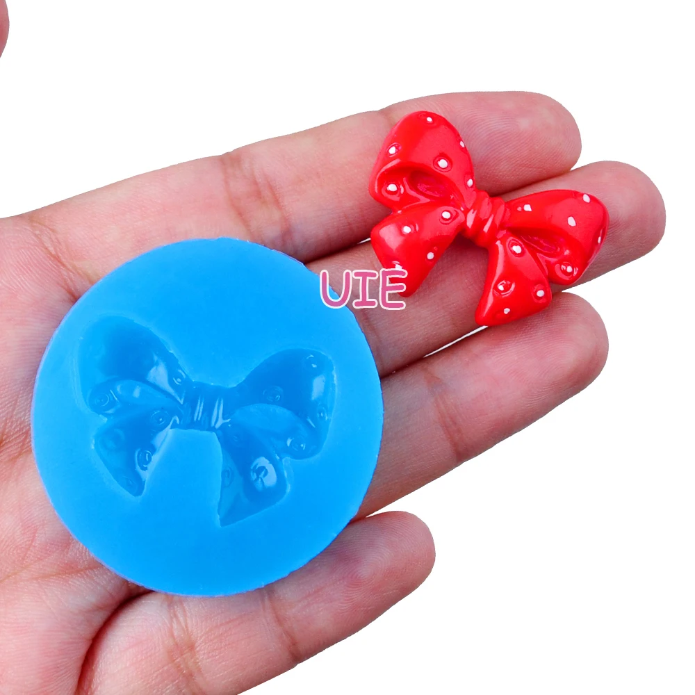 

FYL566U 29,6 мм x 22,5 мм бантом силиконовая форма для выпечки тортов с помадной начинкой конфетного полимерной глины колье и сережек с голубыми рем...