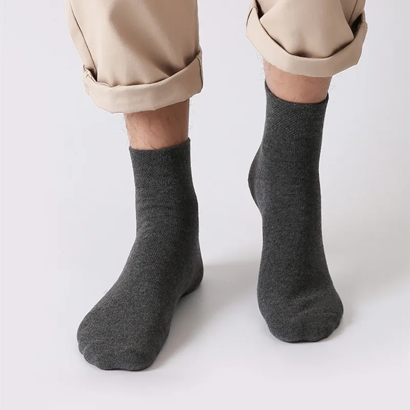 

Socks men's stockings trend autumn and winter long tube thick warm solid color sports men's socks Comfortable and soft new style