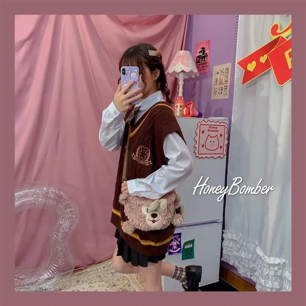 

2021 spring and autumn college style loose V-neck vest knitted sleeveless sweater Korean little fresh vest for female students