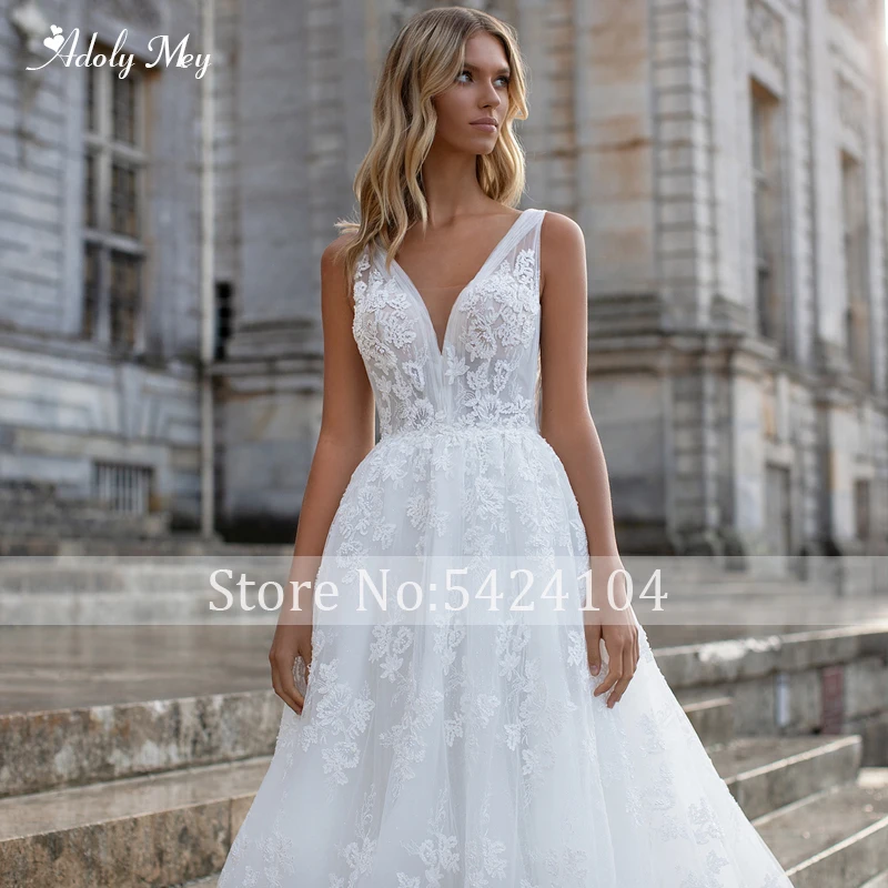 Свадебные платья Adoly Mey с великолепными аппликациями и шлейфом а-силуэт роскошные