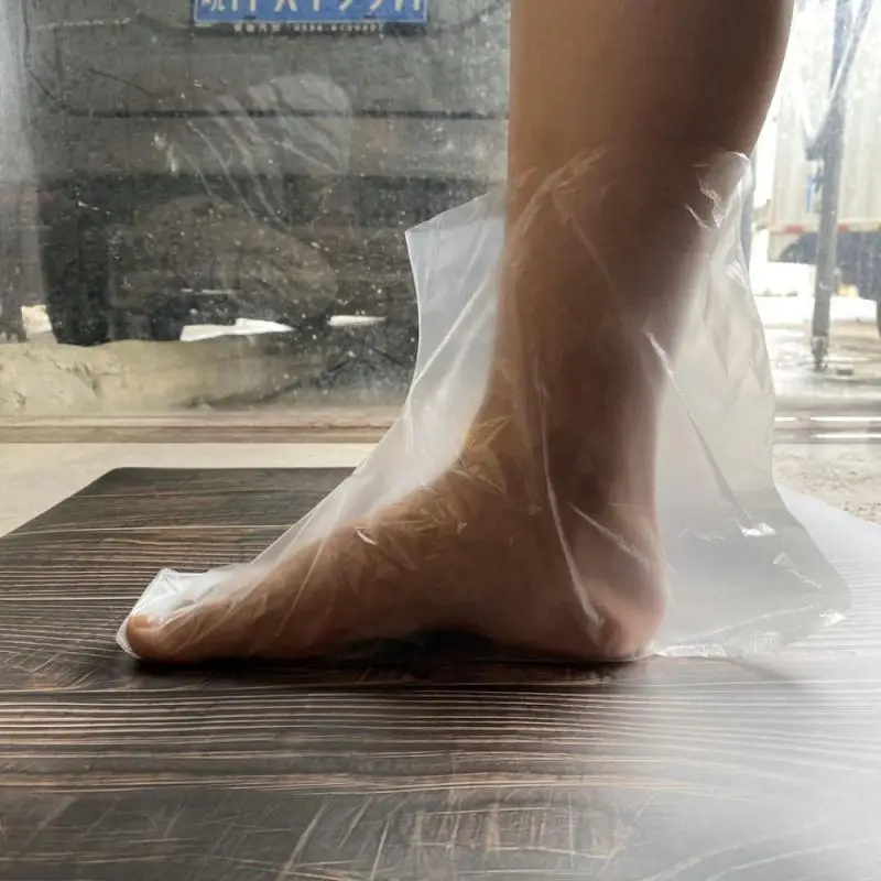 100 шт покрытия ходунков тонкие прозрачные одноразовые бахилы светильник пленка
