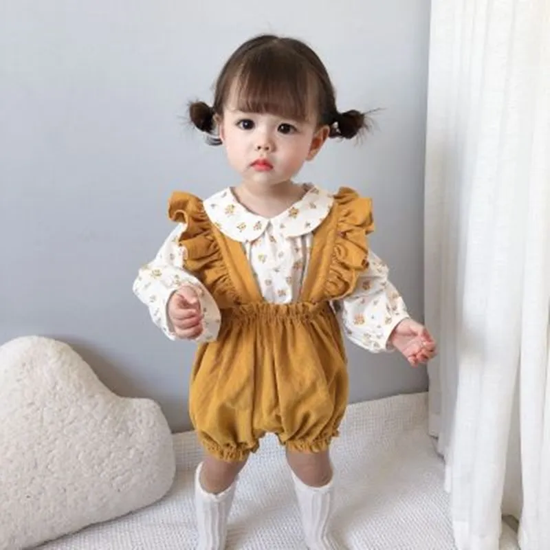 

New autumn girl two-piece baby outing bib baby cute corduroy bud pants Korean version of suspenders girls flower lining top