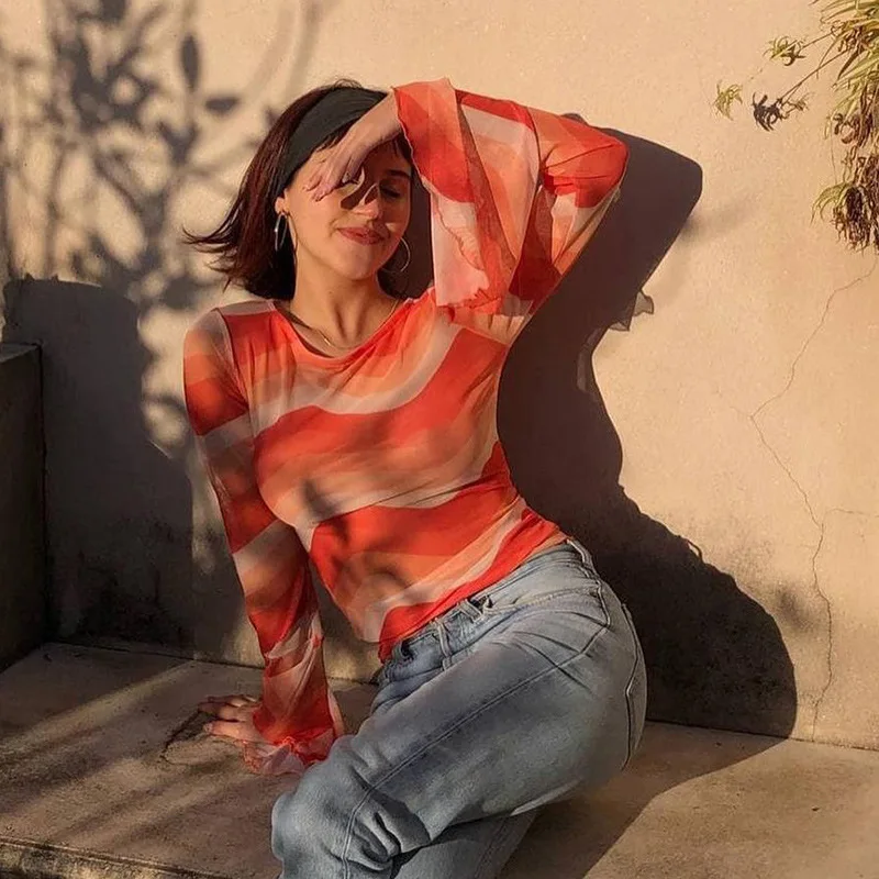 

Fashionable casual simple big cuff printed round neck with wavy lotus leaf sleeves long sleeve top 2021