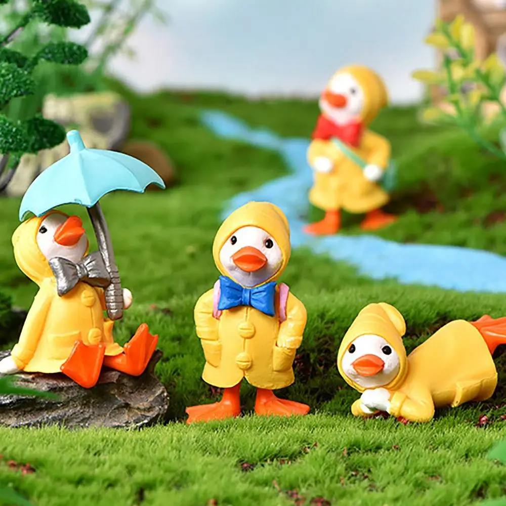 

4pcs Umbrella Raincoat Cute Cartoon Duck miniature Figurine Ornaments Yellow Ducklings Figurine for Miniature Garden Decor