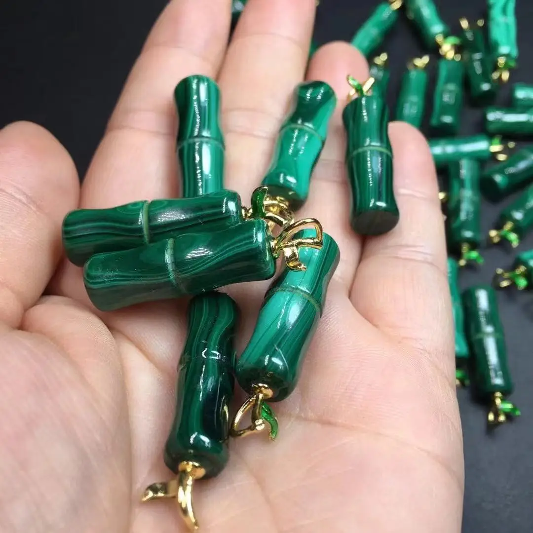 

Natural malachite bamboo joint.Crystalline energy points are used for reiki healing