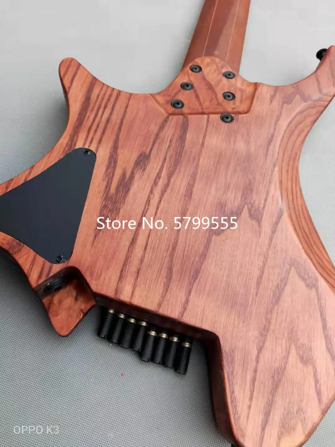 

New 8 string headless electric guitar, twist neck, new headless bridge, golden camphor fingerboard, white wax body, free shippin