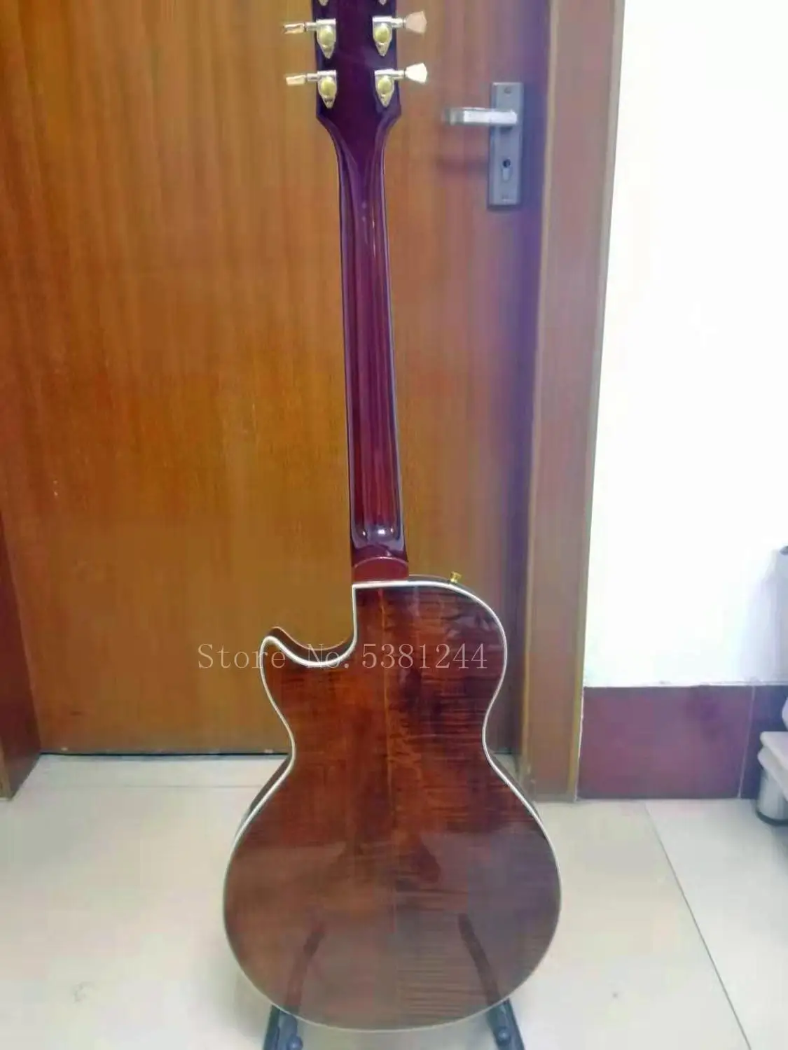 Transporte gratuito guitarra eléctrica personalizada de FABRICA diapason ébano agujero doble f rayas tigre dobles | Спорт и