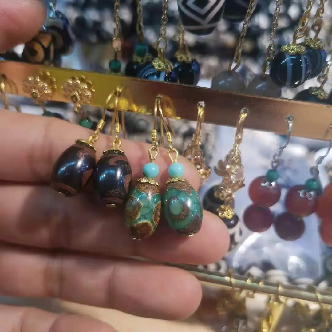

1psc/lot dzi bead earrings are natural and rare with s925 silver inlay A variety of styles and colors jewelry wholesale In bulk