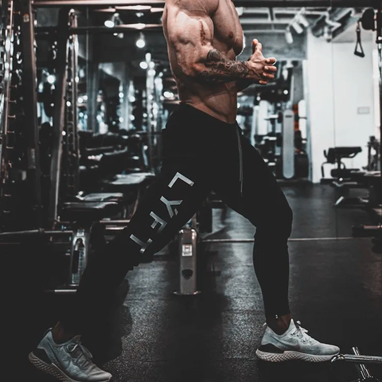 

2021 Muscle Fitness Lyft (fitness) Spring And Autumn Men's Sports Pants New Type Men's Running Fitness Pants Night Running Sport