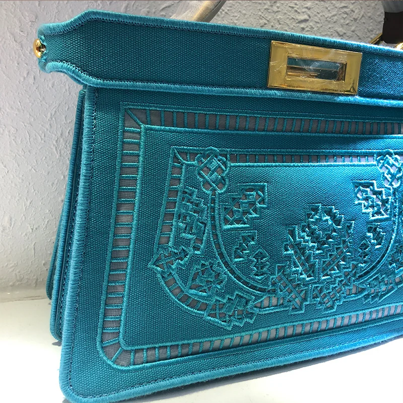 

Retro, solid color, heavy craftsmanship, hollow, embroidery, canvas, handbag, ladies' new fashion, one-shoulder messenger bag