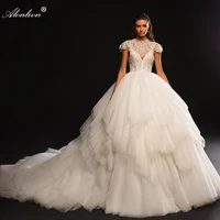 alonlivn lustrous ruffled tiered silky tulle ball gown wedding dresses beading pearls spaghetti straps bridal gowns with jacket