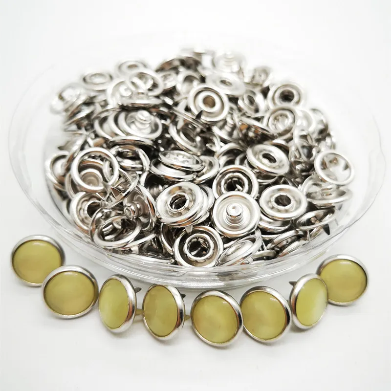 

20 sets of environmentally friendly pearl quality 10 mm hollow 8 color metal brass buckle buckle wholesale children's button