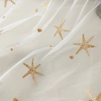 gold sea stars embroidery mesh lace fabric gauze lace fabric for haute couture costumes