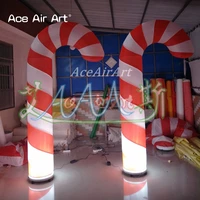 hot sale hite with red stripes canes inflatable candy cane for christmas holiday party with base air blower and bulb lights