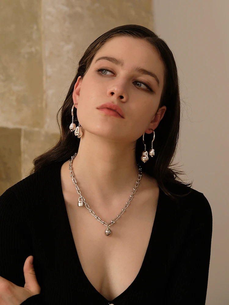 

Fashionable, modern, simple design, exaggerated big round ball, wear earrings before and after