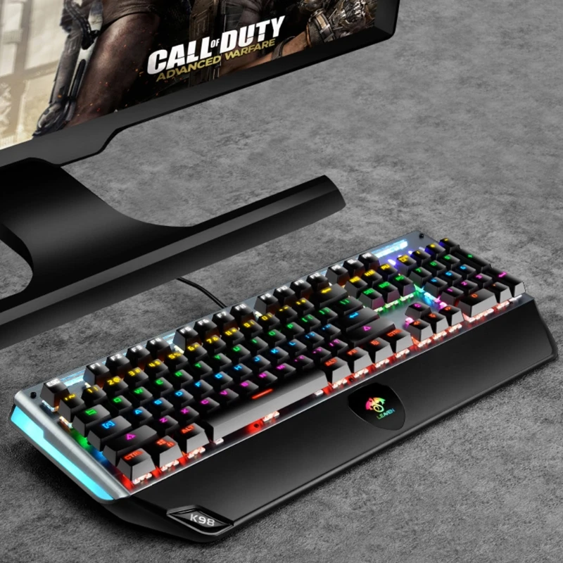 

USB Wired Gaming Keyboard with Hand Rest RGB Light Emitting Metal Keyboard Suitable for Games and Work 104 Keys