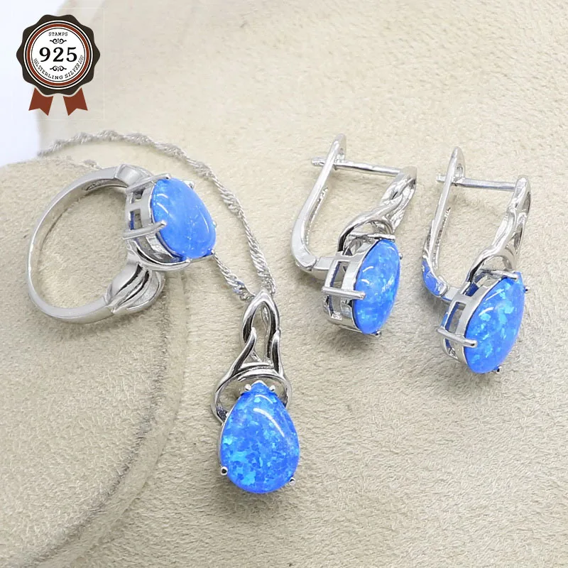 Женский ювелирный комплект из колье и серёг с голубым опалом | Украшения