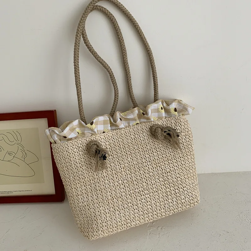 

Summer straw woven bag woman 2020 new Korean version leisure joker woven bag large capacity holiday cross-body bag