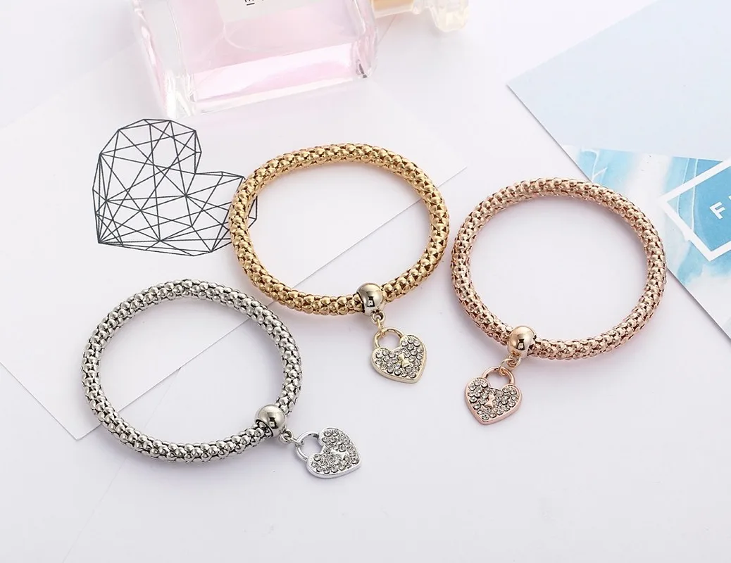 

2020 Three-piece alloy combination bracelet for women elastic corn chain heart-shaped geometric pendant popcorn bangle jewelry