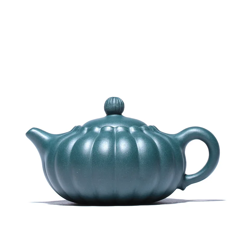 

Yixing purple clay tea set raw ore green mud chrysanthemum bud Ruyi pot rib pattern ware Cao Zhigang handmade teapot in rain