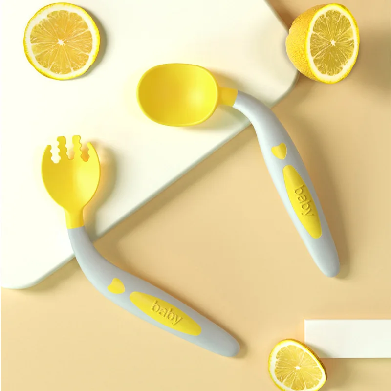 Ребенок учится есть Обучение ложка детские столовые приборы Детские Локоть