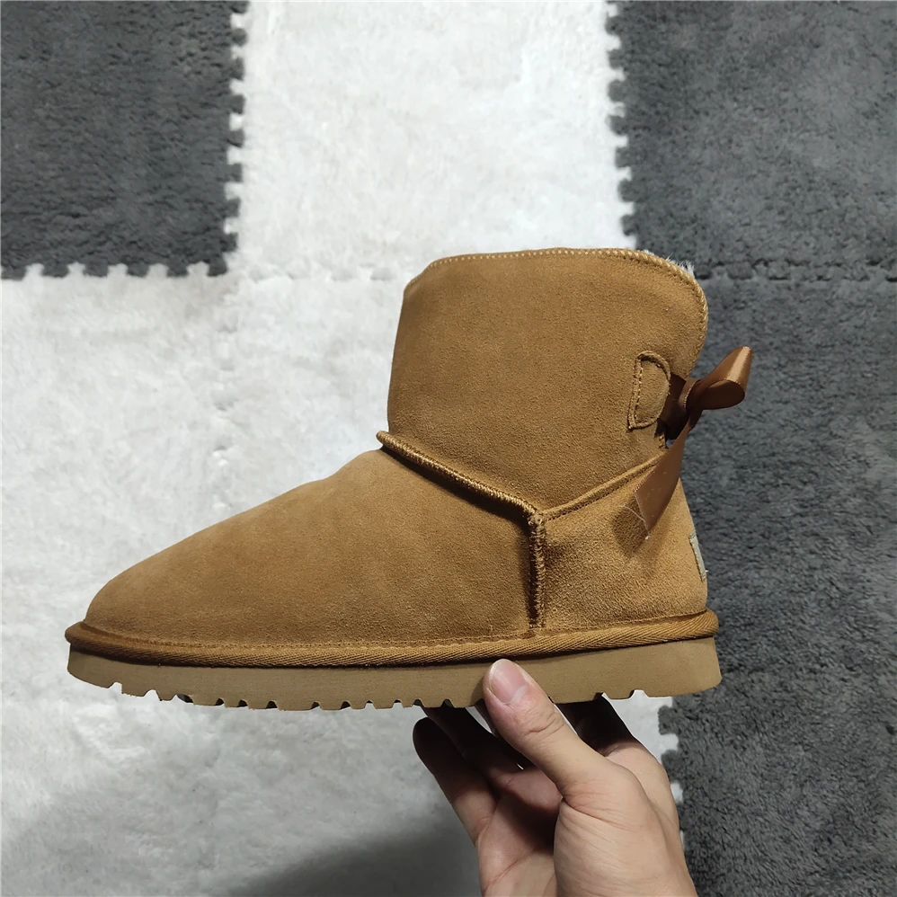 

2022 New Cowhide Leather Short Plush Fur Lined Women Short Ankle Winter Suede Snow Boots with Bowknots Mink Tassels Warm Shoes