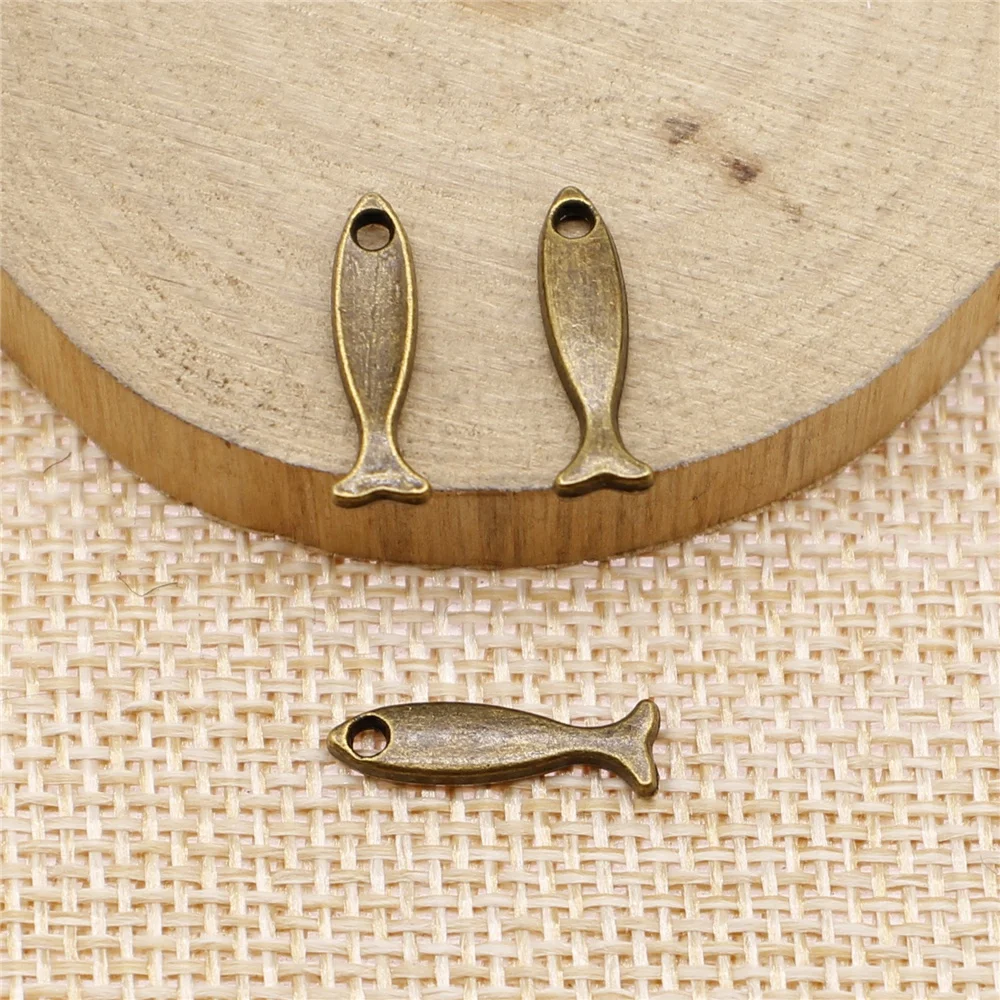 

WYSIWYG 20 шт. 16x5 мм винтажные маленькие подвески-рыбки Шарм для изготовления ювелирных изделий Античная Бронза Подвески-рыбки Шарм