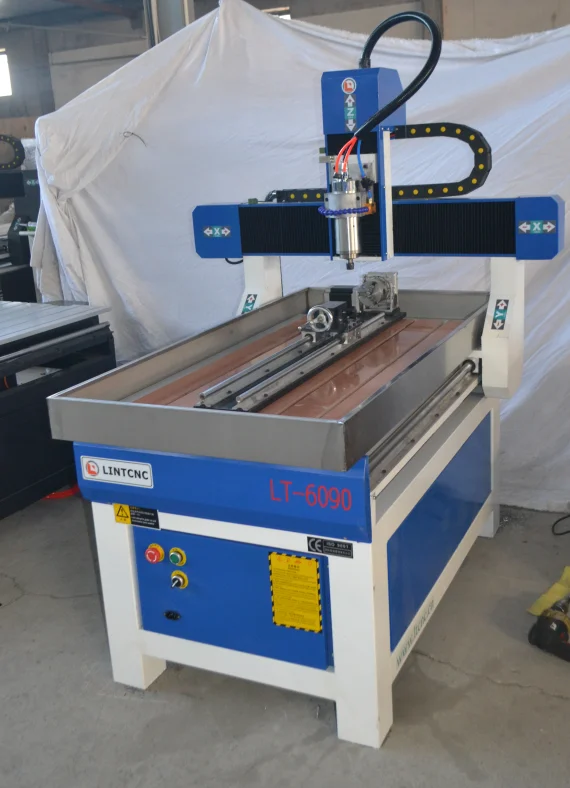 Китай (материк) 4 оси 3 2.2kw 6090 фрезерный станок с ЧПУ по дереву Mach3 система
