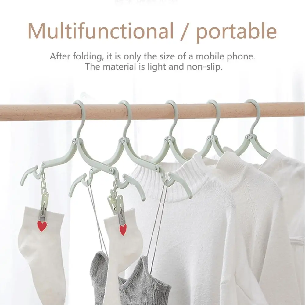 Travel clothes hanger Portable Folding Clothes Hanger Multifunction Magic Stretch Drying Rack Home Wardrobe Storage | Дом и сад