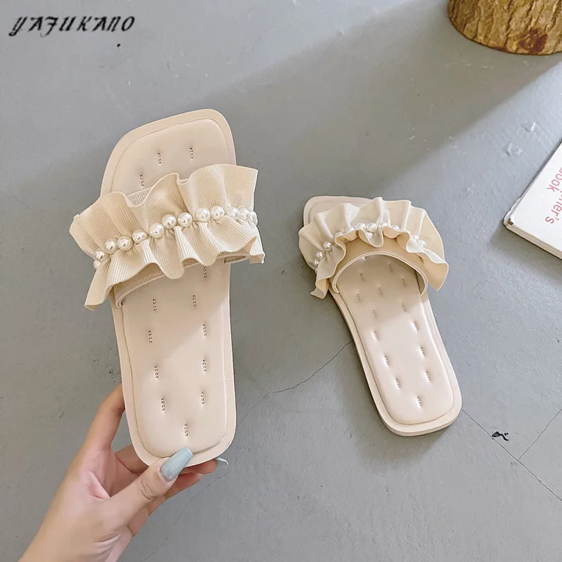 

Elegant Pearl Mesh Sandals Female 2021 New Fairy Style Beach Soft Sole Rome Shoes Sweet String Bead Flat Slippers Pleated Slides