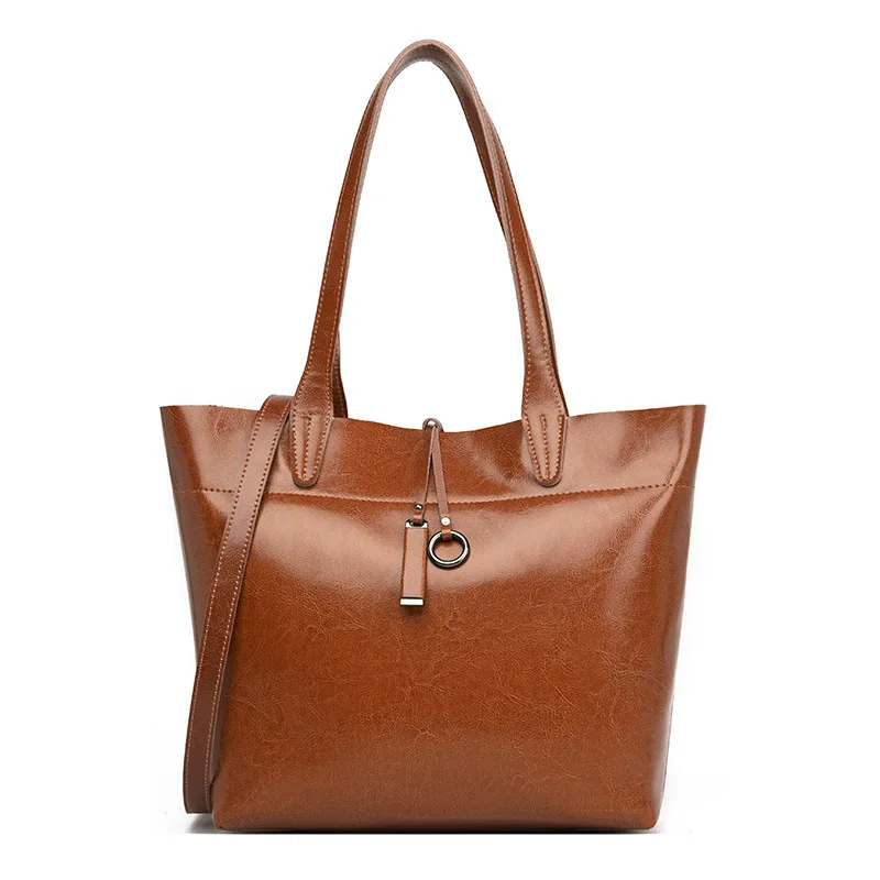 

Leather women's bag simple hand-held bag women's 2021 new large capacity middle-aged mother's bag cow leather one shoulder bag