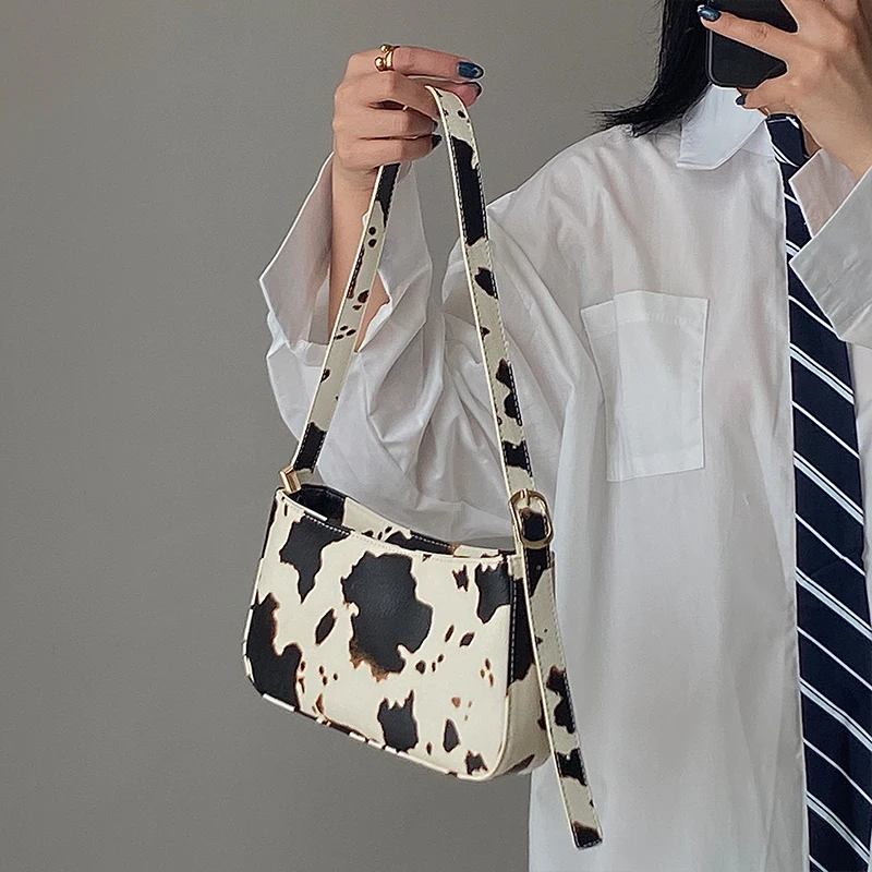 

Fashion Design Milk Cow Print Women Underarm Baguette Handbags Vintage PU Leather Girls Shoulder Messenger Bags Women Armpit Bag