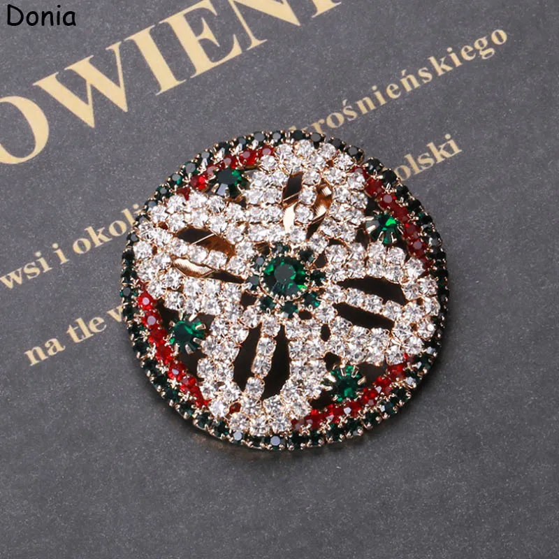 Женская круглая брошь в виде цветка с кисточкой