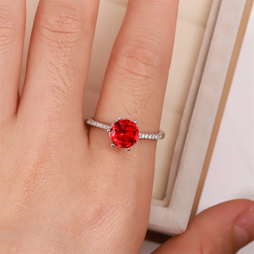 

Best selling European and American S925 silver wedding ring six claw round zircon lady red crystal jewelry lady gift