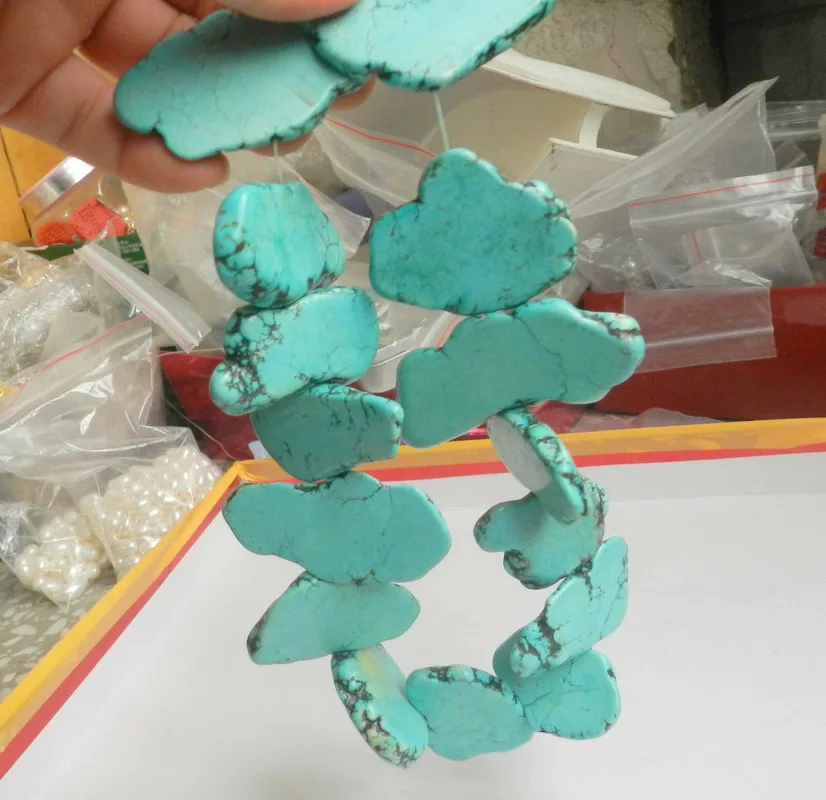 

New 25mm x55mm large chunks of turquoise beads shaped 15"
