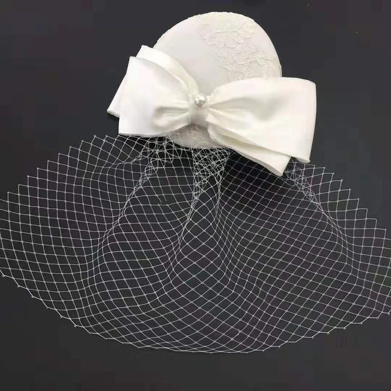 100% Ручная работа Женская федора Шляпа Федоры Платье Фасцинатор Льняное войлоковое Пиллбокс Партийные головные уборы Элегантная свадебная лук Вуаль LM071.