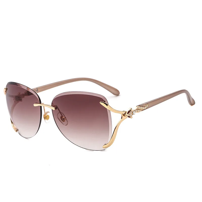 

Free shipping diamond Fashion sunglasses Women Rimless cut edge glasses