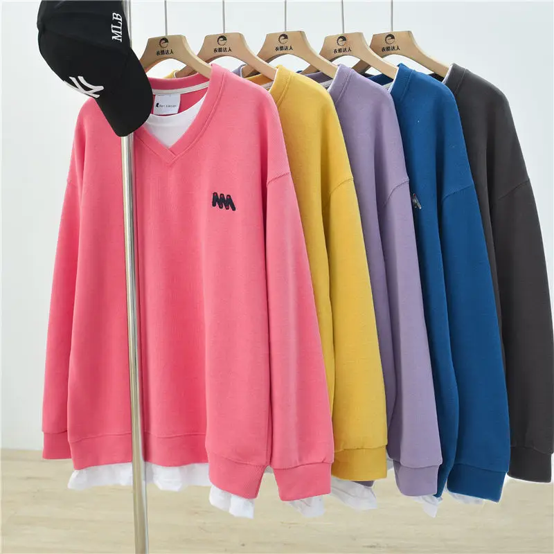 

2021 spring new V-neck fake two-piece sweater women 200 kg loose and thin wild plus size stitching top