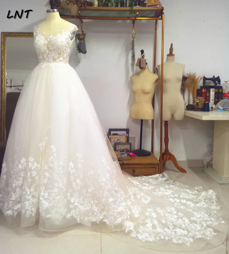 Реальные фотографии дизайнерских свадебных платьев Прозрачный лиф кружевное