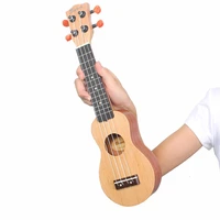 17 inch redwood mini pocket guitar ukulele 4 strings mini hawaii guitarra ukulele music instrument toy with bag for kids gift