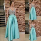 Официальные платья из бисера Вечернее платье трапециевидной формы, с круглым вырезом, без рукавов, длиной до пола